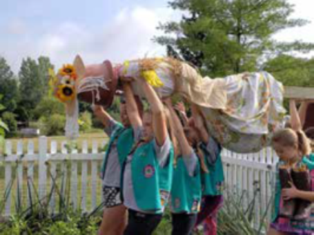 Girl scouts made a scarecrow